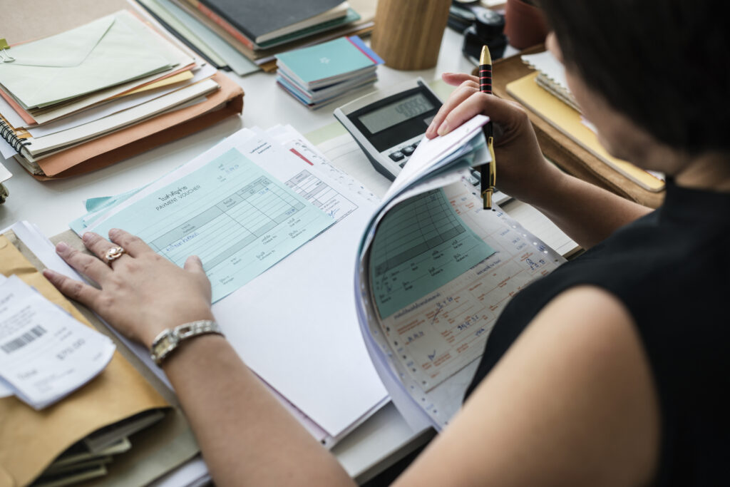 woman working through paperwork