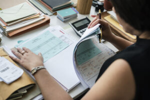 woman working through paperwork
